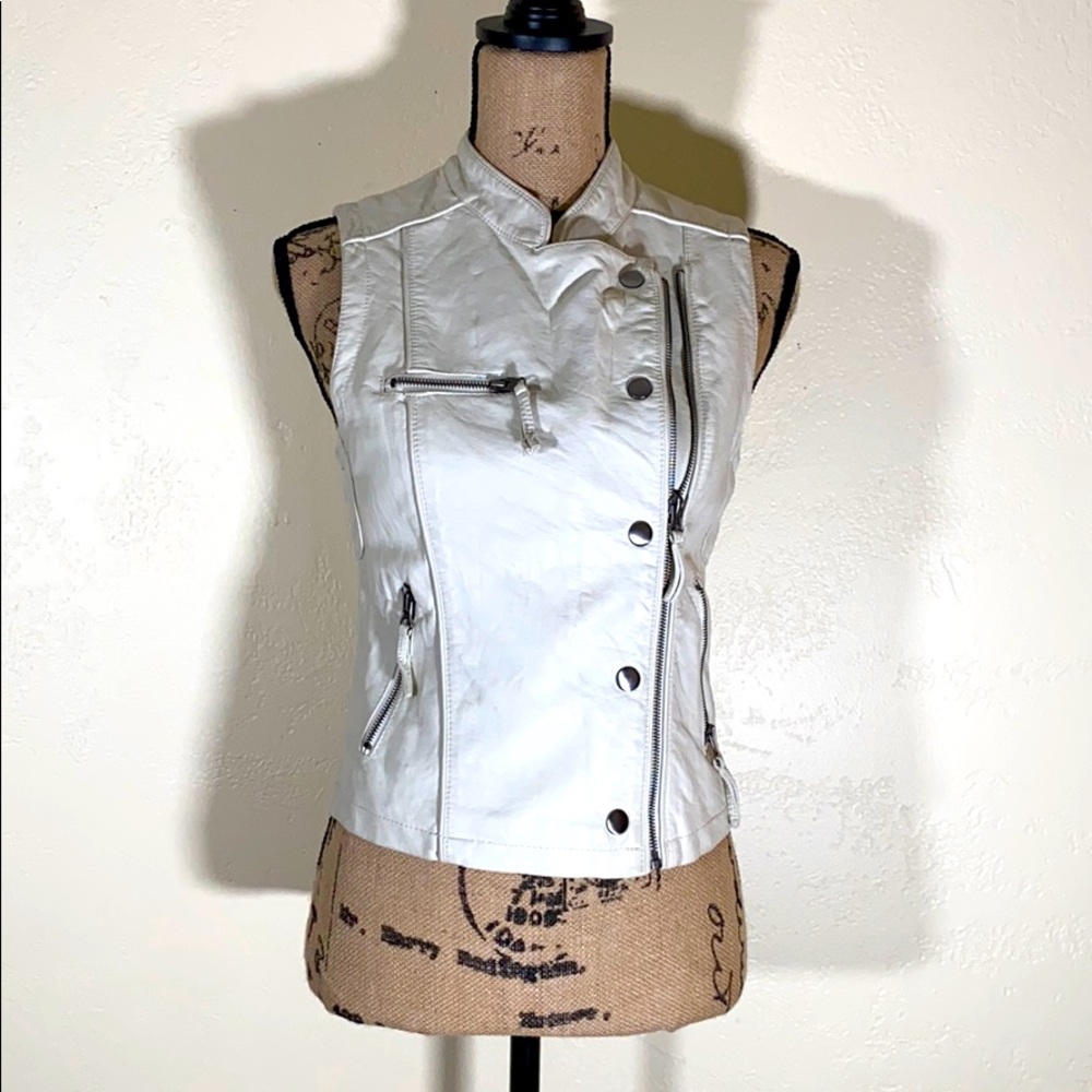 Vests. Pearl white